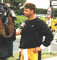 Mike Tomczak talking to the media at practice in Dublin